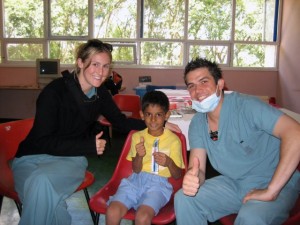 Victoria BC Dentist Dr Pite teaches dental hygiene to child in Africa