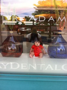 Baby Cole in the window of Victoria BC dentist